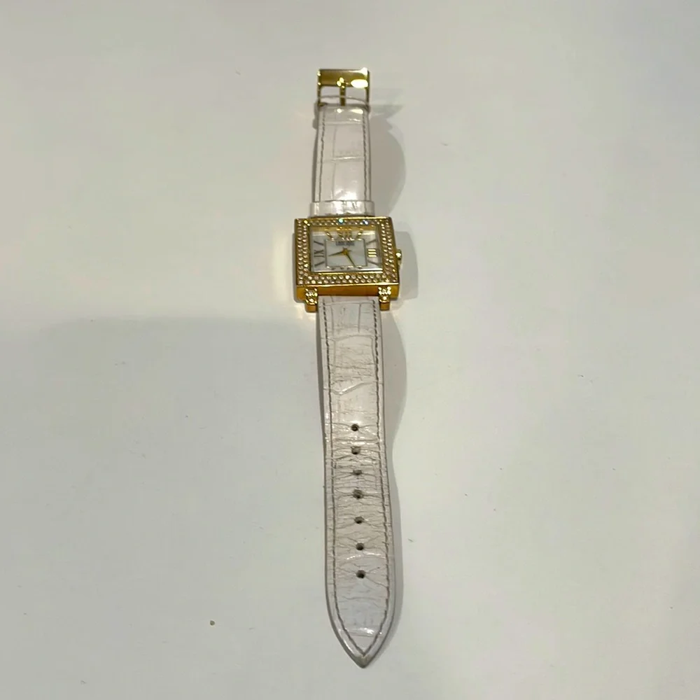 Lanciani Stainless Steel watch with white leather band. GUC
